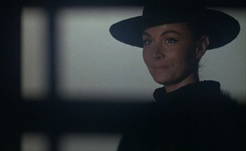 Movie still from “F for Fake” (1973), directed by François Reichenbach – A person wearing a hat; Close Up shot, Low angle