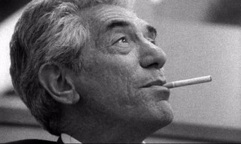 Movie still from “Faces” (1968), directed by John Cassavetes – An older man smoking a cigarette in a black and white photo; Close Up shot, Low angle