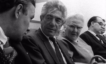 Movie still from “Faces” (1968), directed by John Cassavetes – An older man and two older women sitting next to each other; Close Up shot, Over the shoulder angle