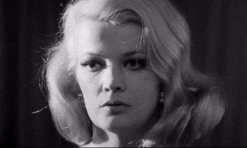 Movie still from “Faces” (1968), directed by John Cassavetes – A black - and - white photo of a woman with blonde hair; Close Up shot, Low angle