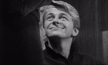 Movie still from “Faces” (1968), directed by John Cassavetes – Black and white photograph of a man looking up; Close Up shot, Low angle