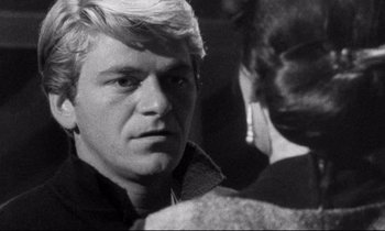 Movie still from “Faces” (1968), directed by John Cassavetes – Black and white photograph of a man and a woman; Close Up shot, Over the shoulder angle