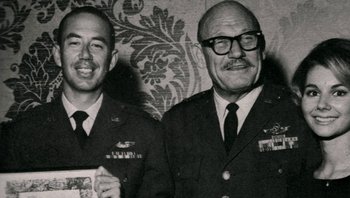 Movie still from “Fahrenheit 9/11” (2004), directed by Michael Moore – A black and white photo of two men in military uniforms; Medium shot, Low angle