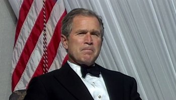 Movie still from “Fahrenheit 9/11” (2004), directed by Michael Moore – George w; Close Up shot, Low angle