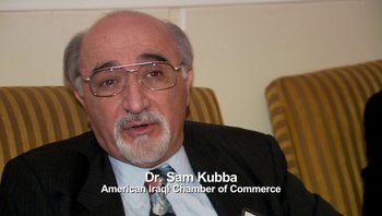 Movie still from “Fahrenheit 9/11” (2004), directed by Michael Moore – An older man wearing a suit and glasses; Close Up shot, High angle