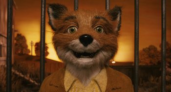 Movie still from “Fantastic Mr. Fox” (2009), directed by Wes Anderson – A man in a suit and tie with a fake animal head; Close Up shot, Low angle