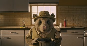 Movie still from “Fantastic Mr. Fox” (2009), directed by Wes Anderson – A hamster wearing a hat and holding a bucket; Medium shot, High angle