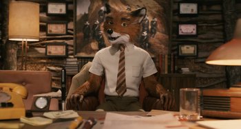 Movie still from “Fantastic Mr. Fox” (2009), directed by Wes Anderson – A man sitting at a desk wearing a suit and tie; Medium shot, Over the shoulder angle