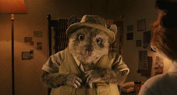 Movie still from “Fantastic Mr. Fox” (2009), directed by Wes Anderson – A stuffed animal dressed like a cat with a hat on; Close Up shot, Low angle