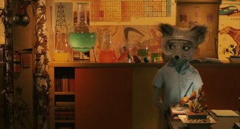 Movie still from “Fantastic Mr. Fox” (2009), directed by Wes Anderson – A person in a room filled with lots of lab glassware; Wide shot, High angle