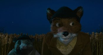 Movie still from “Fantastic Mr. Fox” (2009), directed by Wes Anderson – A stuffed animal dressed as a man; Close Up shot, Over the shoulder angle