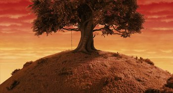 Movie still from “Fantastic Mr. Fox” (2009), directed by Wes Anderson – A tree with a swing hanging from it's branches; Extreme Wide shot, High angle
