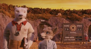 Movie still from “Fantastic Mr. Fox” (2009), directed by Wes Anderson – A couple of stuffed animals that are next to each other; Medium shot, Over the shoulder angle