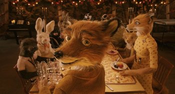 Movie still from “Fantastic Mr. Fox” (2009), directed by Wes Anderson – Many people sitting at the table; Close Up shot, High angle
