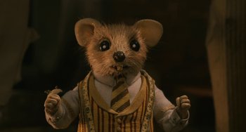 Movie still from “Fantastic Mr. Fox” (2009), directed by Wes Anderson – A stuffed mouse wearing a suit and tie; Close Up shot, Low angle