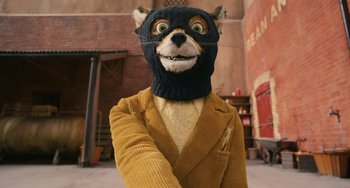 Movie still from “Fantastic Mr. Fox” (2009), directed by Wes Anderson – A stuffed animal dressed in a suit and a balaclava; Close Up shot, High angle
