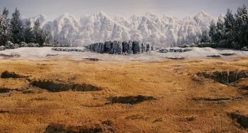 Movie still from “Fantastic Mr. Fox” (2009), directed by Wes Anderson – An image of a desert with mountains in the background; Extreme Wide shot, High angle