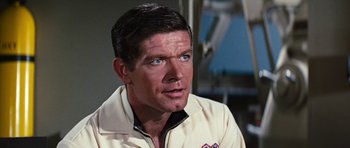 Movie still from “Fantastic Voyage” (1966), directed by Richard Fleischer – A person wearing a jacket; Close Up shot, High angle