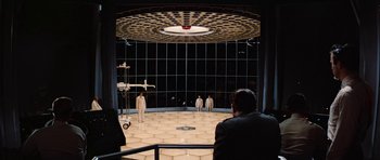 Movie still from “Fantastic Voyage” (1966), directed by Richard Fleischer – A group of people standing in front of a window; Extreme Wide shot, High angle