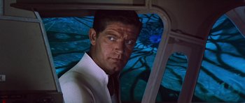 Movie still from “Fantastic Voyage” (1966), directed by Richard Fleischer – A person wearing a suit and tie; Close Up shot, High angle