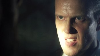 Movie still from “Father's Day” (2011), directed by Conor Sweeney – A man's face in the dark; Close Up shot, Low angle