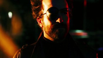 Movie still from “Father's Day” (2011), directed by Conor Sweeney – A person wearing a eye patch; Close Up shot, Low angle