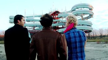 Movie still from “Father's Day” (2011), directed by Conor Sweeney – A group of people standing next to each other; Medium shot, Over the shoulder angle