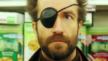 Movie still from “Father's Day” (2011), directed by Conor Sweeney – A person wearing a eye patch; Close Up shot, Low angle