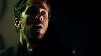 Movie still from “Father's Day” (2011), directed by Conor Sweeney – A person looking at the camera; Close Up shot, Low angle