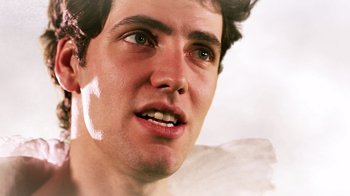 Movie still from “Father's Day” (2011), directed by Conor Sweeney – A young man's face with white paint on it; Close Up shot, Low angle