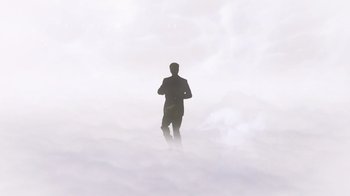 Movie still from “Father's Day” (2011), directed by Conor Sweeney – A man standing in the middle of a cloud filled sky; Extreme Wide shot, Low angle