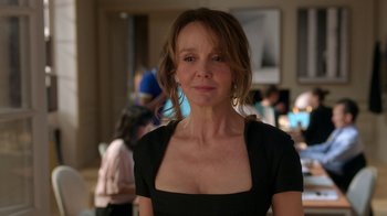 Movie still from “Emily in Paris” (2020), created by Darren Star – A person wearing a black shirt; Close Up shot, Over the shoulder angle