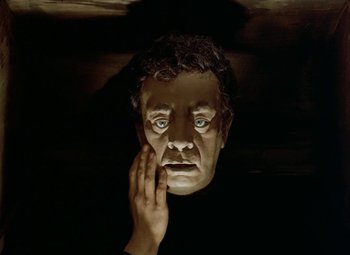 Movie still from “Faust” (1994), directed by Jan Svankmajer – A painting of a man's face in a dark room; Close Up shot, Low angle