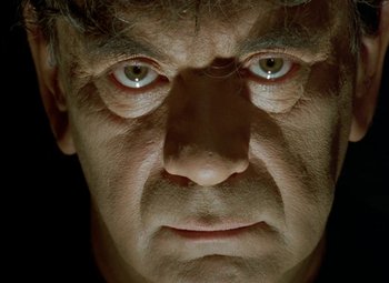 Movie still from “Faust” (1994), directed by Jan Svankmajer – A man's eyes and face; Close Up shot, Low angle