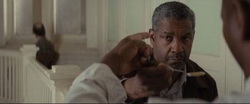 Movie still from “Fences” (2016), directed by Denzel Washington – An older black man pointing to his face; Close Up shot, Over the shoulder angle