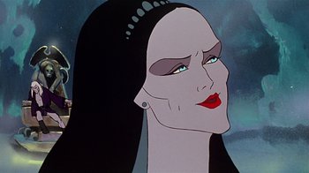 Movie still from “Fire and Ice” (1983), directed by Ralph Bakshi – A woman's face in a cartoon style; Close Up shot, Low angle
