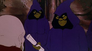 Movie still from “Fire and Ice” (1983), directed by Ralph Bakshi – A couple of people that are dressed up in purple robes; Medium shot, Over the shoulder angle
