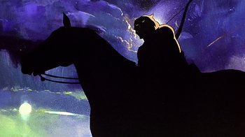 Movie still from “Fire and Ice” (1983), directed by Ralph Bakshi – The silhouette of a person riding a horse in the night sky; Wide shot, Low angle