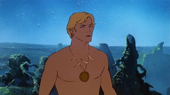 Movie still from “Fire and Ice” (1983), directed by Ralph Bakshi – A man with no shirt is standing in front of some trees; Medium shot, Low angle
