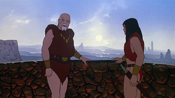 Movie still from “Fire and Ice” (1983), directed by Ralph Bakshi – An animated scene of a man and a woman; Medium shot, Over the shoulder angle