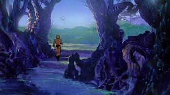 Movie still from “Fire and Ice” (1983), directed by Ralph Bakshi – A painting of a man walking through the woods; Extreme Wide shot, Low angle