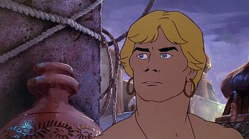 Movie still from “Fire and Ice” (1983), directed by Ralph Bakshi – A cartoon character with blue eyes; Close Up shot, Low angle