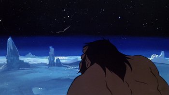 Movie still from “Fire and Ice” (1983), directed by Ralph Bakshi – An animated scene of a man looking out at the sky; Wide shot, Low angle