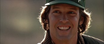 Movie still from “Fire in the Sky” (1993), directed by Robert Lieberman – A person wearing a hat; Close Up shot, Low angle