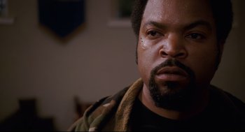 Movie still from “First Sunday” (2008), directed by David E. Talbert – A person with a beard; Close Up shot, Over the shoulder angle