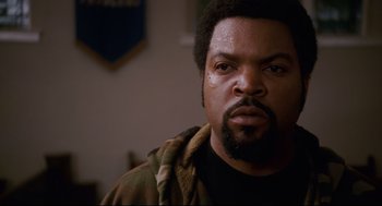 Movie still from “First Sunday” (2008), directed by David E. Talbert – A person with a beard; Close Up shot, Over the shoulder angle