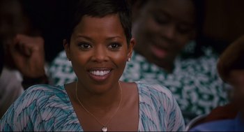 Movie still from “First Sunday” (2008), directed by David E. Talbert – A person with short black hair; Close Up shot, Over the shoulder angle