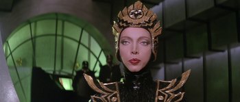 Movie still from “Flash Gordon” (1980), directed by Mike Hodges – A person wearing a costume; Close Up shot, Low angle