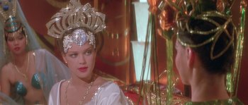 Movie still from “Flash Gordon” (1980), directed by Mike Hodges – A person wearing a costume; Close Up shot, Over the shoulder angle