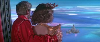 Movie still from “Flash Gordon” (1980), directed by Mike Hodges – A man and a woman dressed up in a costume; Medium shot, Over the shoulder angle